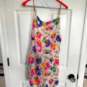 Size small sequined mini dress with gold chain straps. Never worn